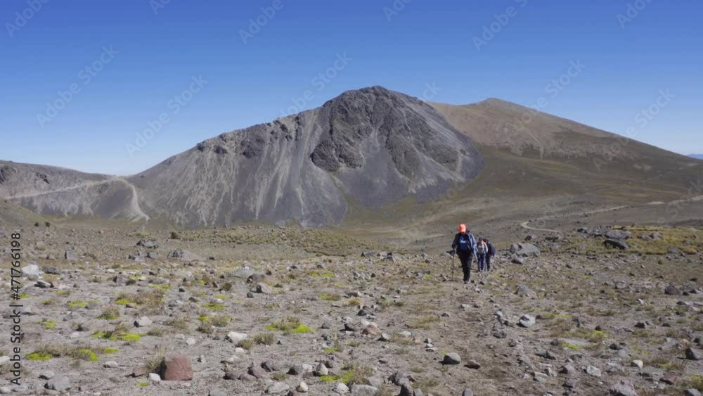 hikers walking to the summit of the nevado de toluca volcano
