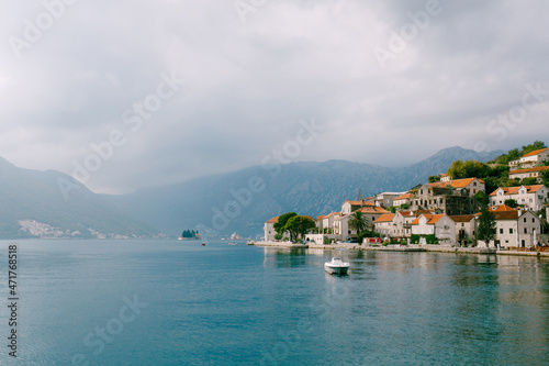 Boat sails past the coast of Perast. Montenegro