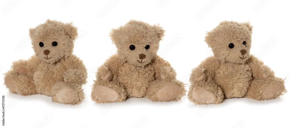 Handmade brown teddy bear on white background. Three position. Full depth of field. Handmade brown teddy bear on white background. Three position. Full depth of field.