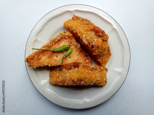 Fried crackers filled by ragout, vegetarian snack popular in Indonesia. Isolated on white background. photo