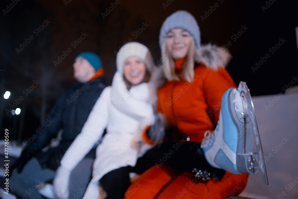 Fototapeta premium group of friends skating rink winter, entertainment christmas night, sports fun youth
