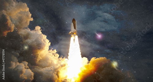 Fototapeta Naklejka Na Ścianę i Meble -  Space shuttle taking , Spaceship lift off with blast and smoke on the background of the blue planet earth and sunset.Elements of this image furnished by NASA