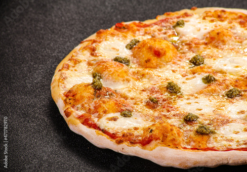 Italian Pizza with mozzarella and pesto