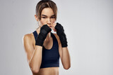 slender woman in boxing bandages workout fitness fighter studio gym