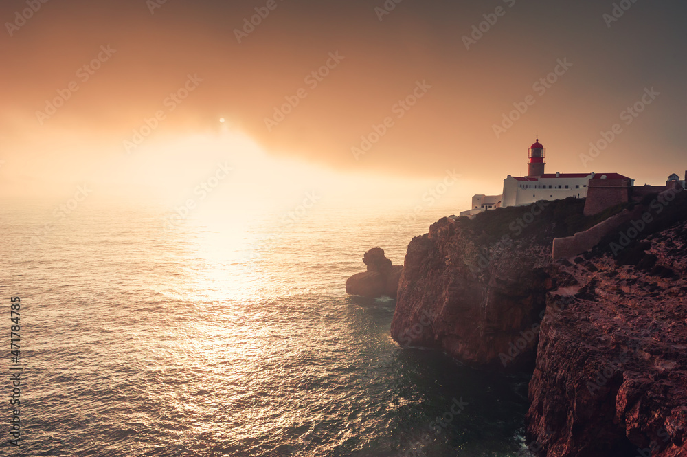 Lighthouse on Cape St. Vincent at sunset in Algarve, Portugal. Summer landscape. South-Western point of Europe