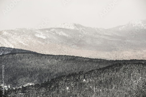 snow-covered mountain slopes on a winter morning