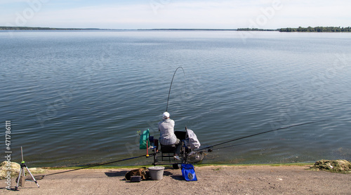 A man fishing with a rod