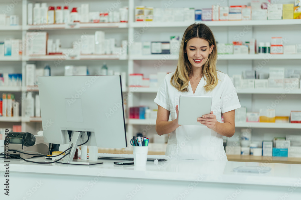 Portrait of a beautiful female pharmacist working in a pharmacy