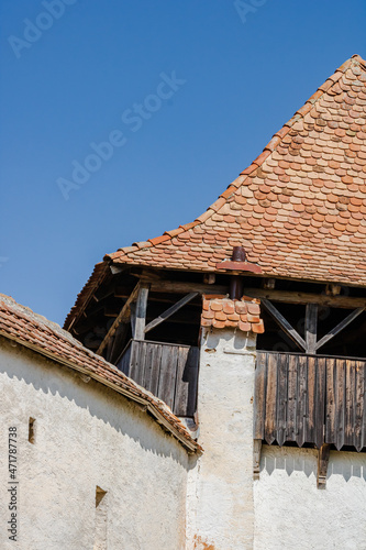 Architectural details of medieval church. View of fortified church of Viscri, UNESCO heritage site in Transylvania. Romania, 2021. photo