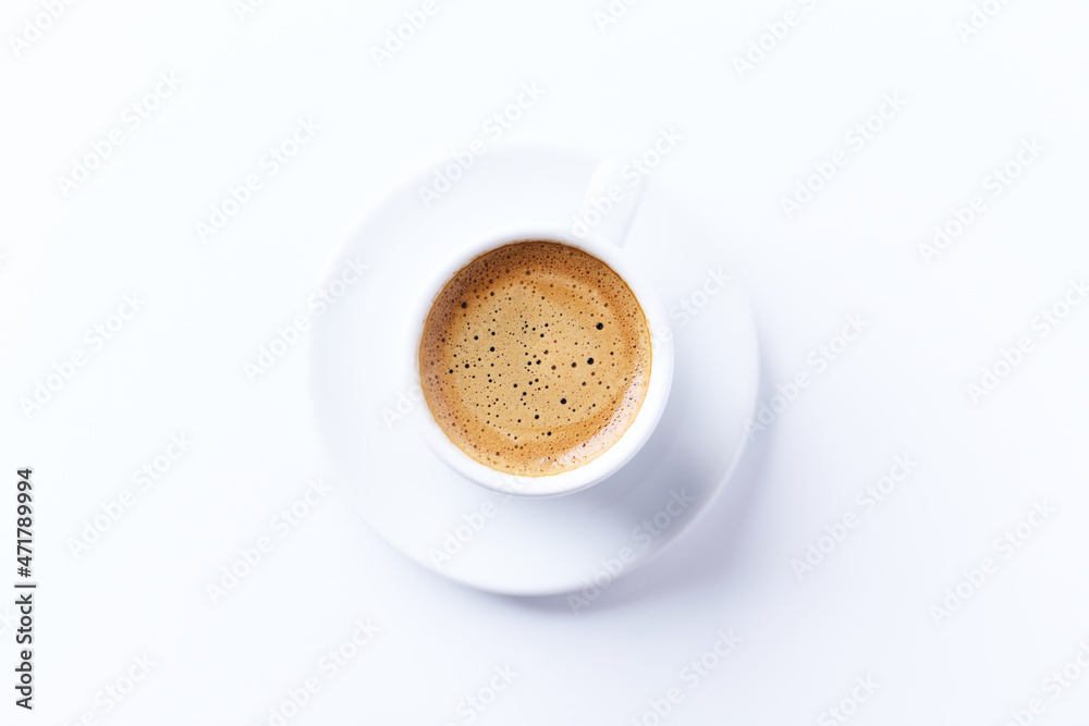 Cup of coffee on bright paper background. Top view. Close up. Copy space. Cup of coffee on bright paper background. Top view. Close up. Copy space.