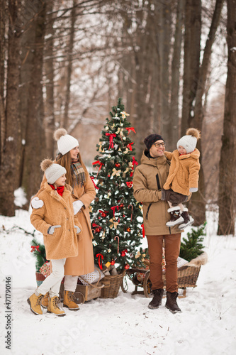 New Years postcard family photo with a Christmas tree in nature 3521.