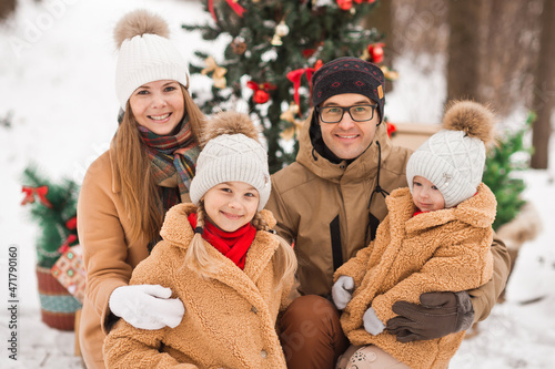 New Years postcard family photo with a Christmas tree in nature 3522.