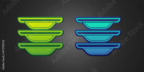 Green and blue Washing dishes icon isolated on black background. Cleaning dishes icon. Dishwasher sign. Clean tableware sign. Vector