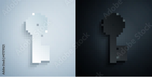 Paper cut Old key icon isolated on grey and black background. Paper art style. Vector