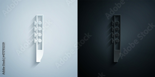 Paper cut Flute icon isolated on grey and black background. Musical instrument. Paper art style. Vector