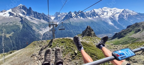 Going down with the chairlift from Lac Blanc on a sunny summer morning, France