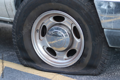 Flat and Damaged Vehicle Tire