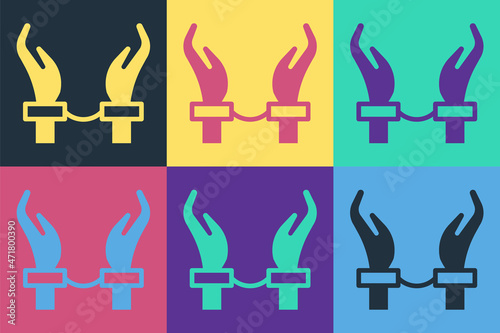 Pop art Handcuffs on hands of criminal man icon isolated on color background. Arrested man in handcuffs. A crime, arrest, business and corruption concept. Vector