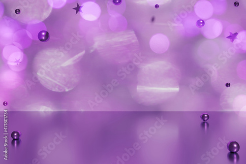 3d render of flying purple Christmas balls and stars on a purple bokeh background