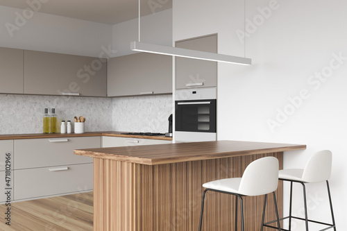 Modern white and beige corner kitchen