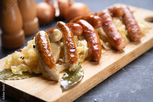 Grilled german sausage links with sauerkraut
