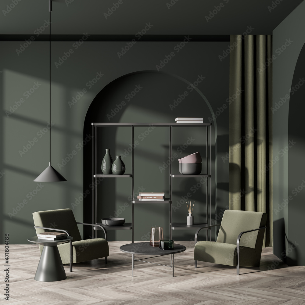Green relaxing room interior with two armchairs and rack with decoration Green relaxing room interior with two armchairs and rack with decoration