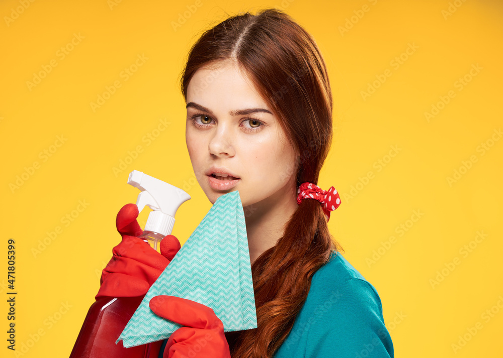 woman in rubber gloves detergent cleaning housework yellow background woman in rubber gloves detergent cleaning housework yellow background