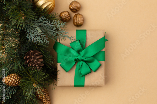 Gift boxes wrapped in craft paper with ribbon and bow © Retan