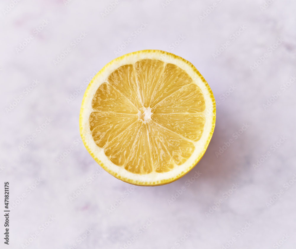 Lemon half fruit on a marble surface Lemon half fruit on a marble surface
