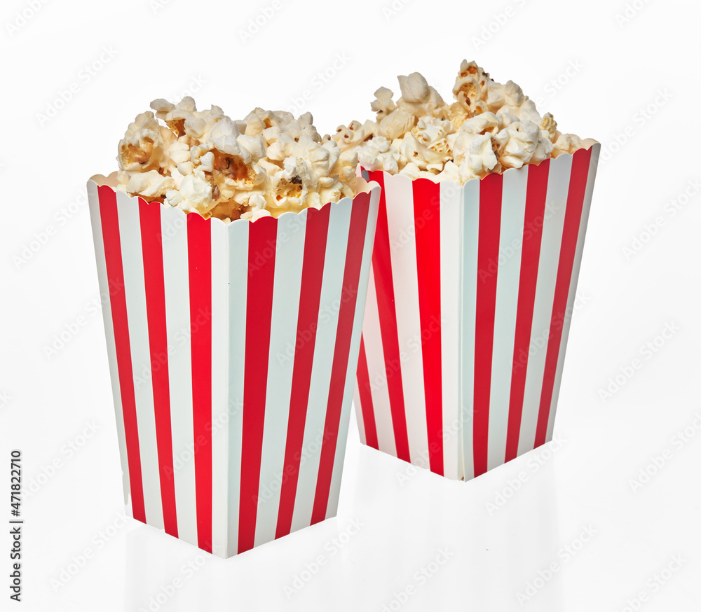Two packs of salty popcorns isolated on a white background Two packs of salty popcorns isolated on a white background
