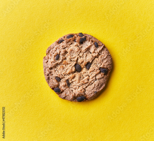  Delicious chocolate cookie on a yellow background