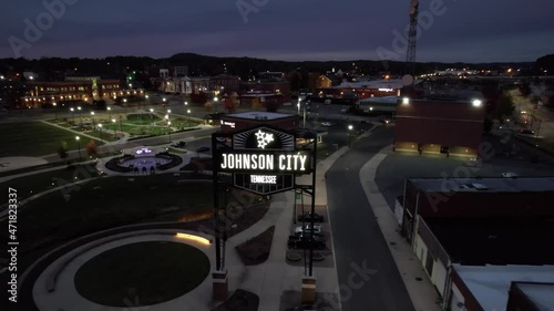 Johnson City, Tennessee USA, Aerial View of Shinning Sign With Town Name and Cityscape at Night photo