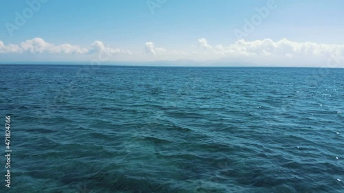 Drone fly over water in ocean in slowmotion. High quality FullHD footage