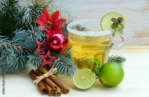 Hot Hugo with limes and fir branches, copy space
