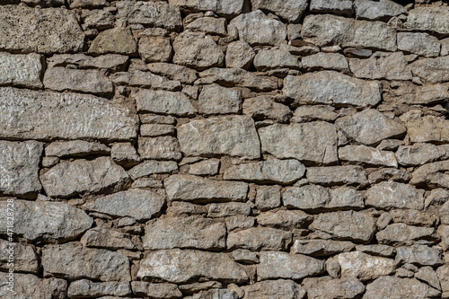 pattern gray color of modern style design decorative uneven cracked real stone wall
