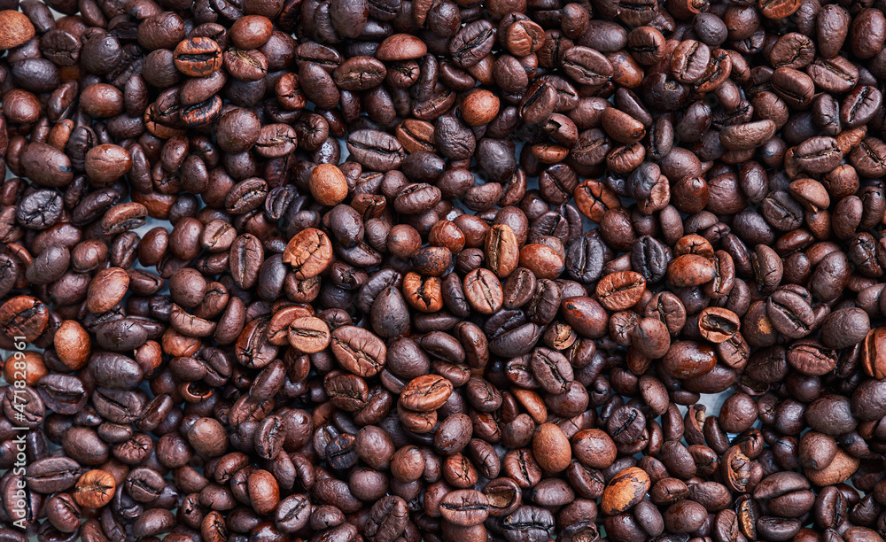 Brown and black coffee beans. Roasted arabic espresso coffee grains. Brown and black coffee beans. Roasted arabic espresso coffee grains.