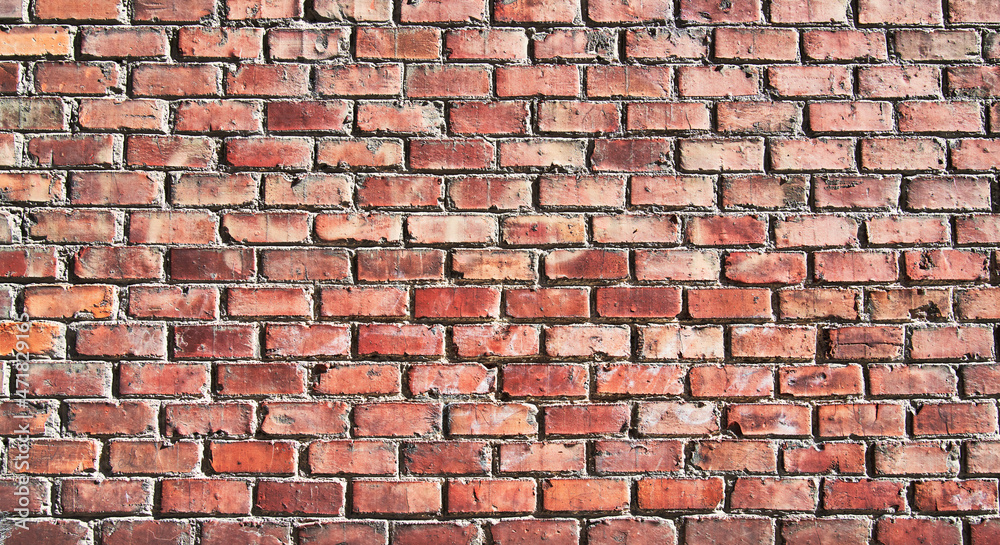 Brick wall texture with cracked tiles and cement. Classic brickwall surface background Brick wall texture with cracked tiles and cement. Classic brickwall surface background