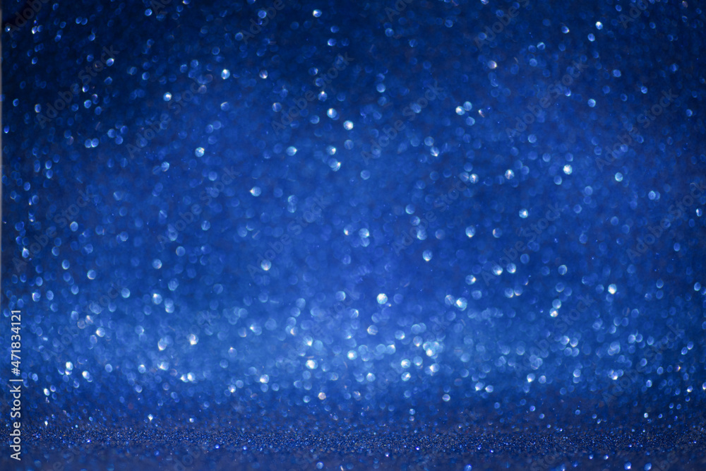 Blue christmas background. Soft focus, highlights and bokeh