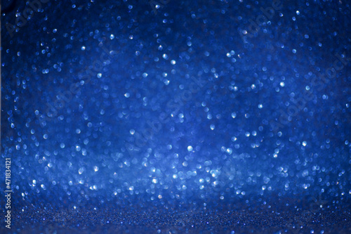 Blue christmas background. Soft focus, highlights and bokeh