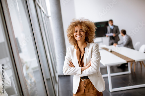 Young businesswoman standin...