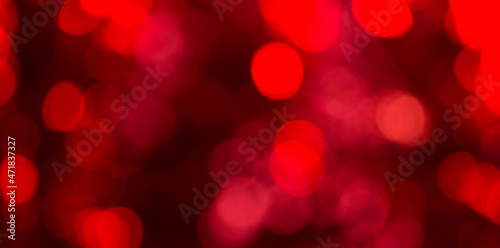 Photo of shiny red bokeh background