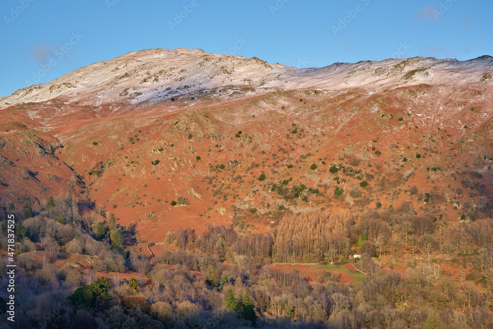 A dusting of snow on the summit of Heron Pike, above Rydal Water, Lake District, UK