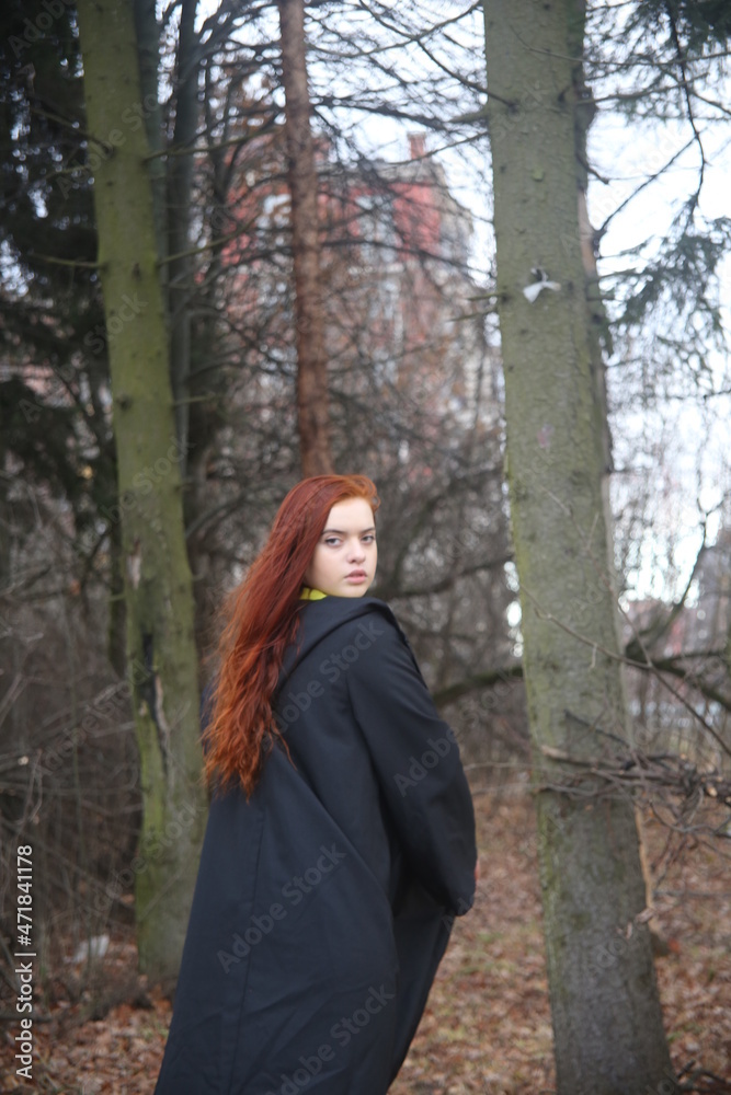 portrait of a young girl with red hair in a raincoat beauty female cute pretty face lady amazing woman black fashion model autumn outdoors smile nature forest portrait of a young girl with red hair in a raincoat beauty female cute pretty face lady amazing woman black fashion model autumn outdoors smile nature forest