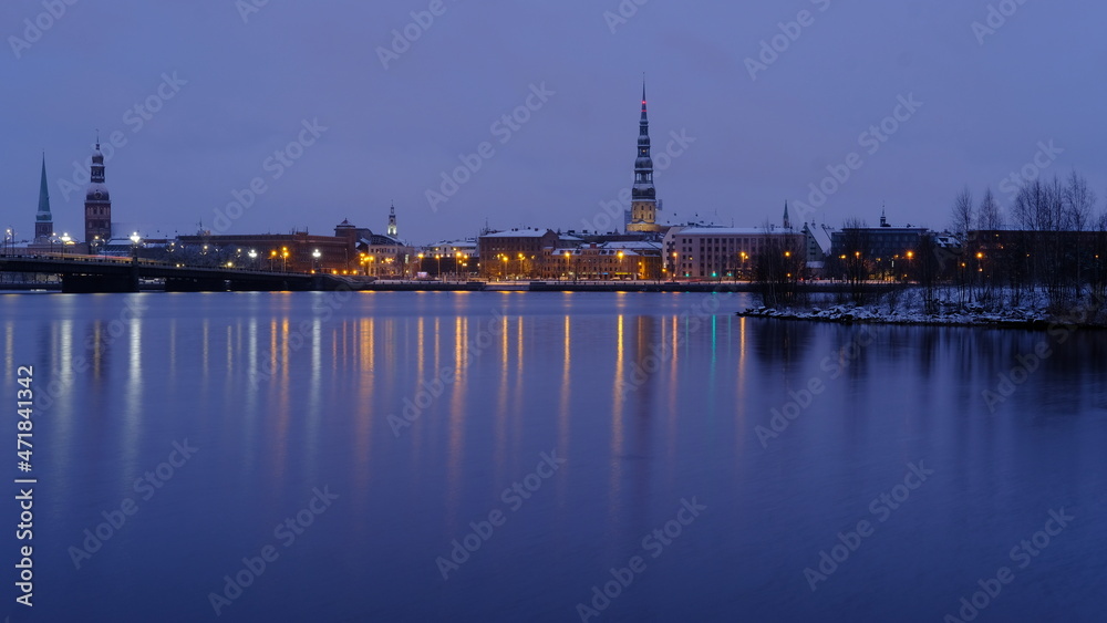 Reflection of old Riga on an early morning in the Daugava in autumn