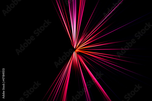 Abstract surface of radial zoom blur in pink and lilac tones on a black background. Abstract pink black background with radial, diverging, converging lines. 