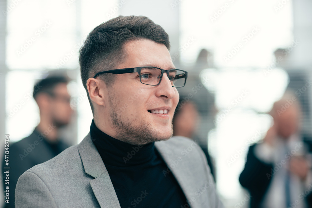 confident business man standing in the office confident business man standing in the office