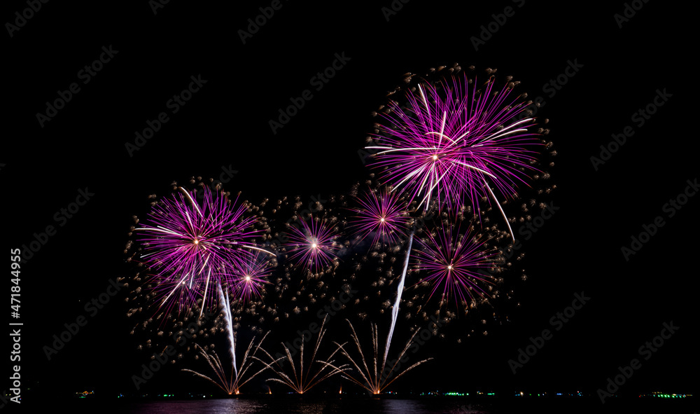 Fireworks at the sea in night time for celebration of new years Fireworks at the sea in night time for celebration of new years