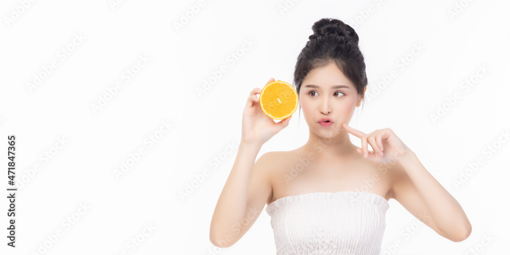Young beauty girl show slice of orange Vitamin C for nice skin Young asian woman make funny face isolated on white background Young Asia lady with beauty face and nice skin Eat fruit get good health Young beauty girl show slice of orange Vitamin C for nice skin Young asian woman make funny face isolated on white background Young Asia lady with beauty face and nice skin Eat fruit get good health
