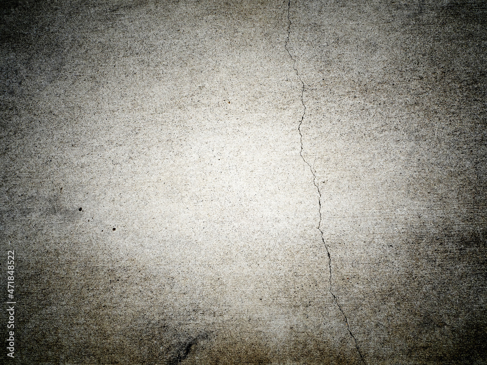 Obraz premium ヒビの入った暗いコンクリートのテクスチャー素材