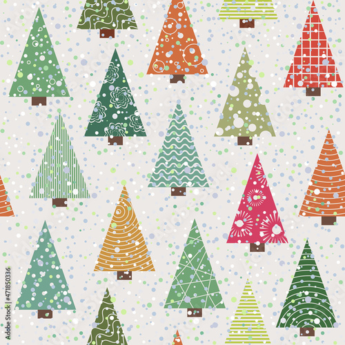Seamless pattern Christmas forest during a snowfall on a light background. © innessavv